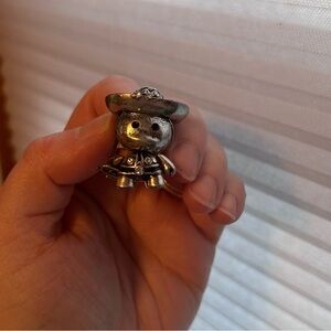 Silver Figurine with Hat and trumpet